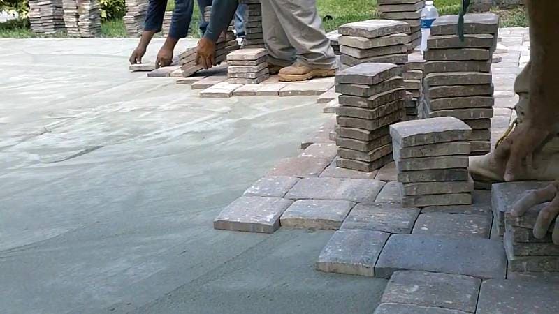 pavers installed over concrete driveway concrete overlay used for resurfacing a concrete driveway