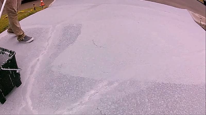 resurfacing a concrete driveway with an epoxy coating